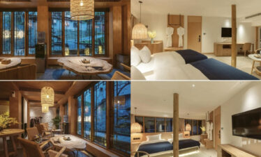 Sanchunli Boutique Inn, guizhou, china, china tour, Open-plan hotel suite with twin beds, wooden beams, and a sitting area framed by large grid windows at dusk/evening light.