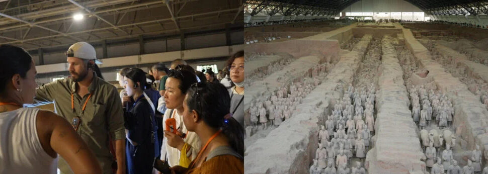 xi'an, china, china tour, Group of visitors on a guided tour in an indoor space with orange lanyards, beside a long excavation pit of clay figures on the right.
