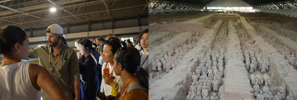 xi'an, china, china tour, Group of visitors on a guided tour in an indoor space with orange lanyards, beside a long excavation pit of clay figures on the right.
