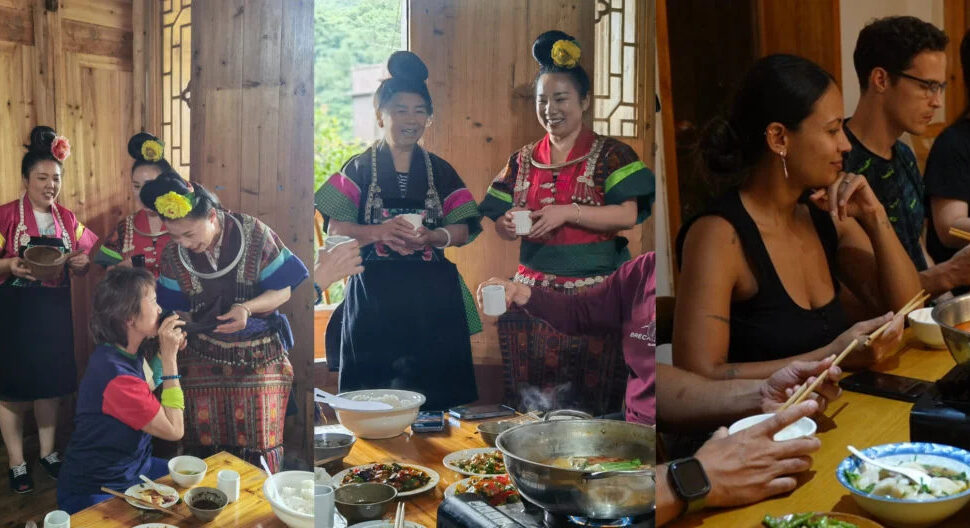 guizhou , chinatravel, Women in bright traditional dresses serve tea to guests at a wooden dining table during a cultural meal.