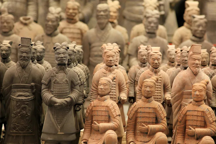 Qin Shihuang Terracotta Warriors, xi'an, shaanxi, china tour, Rows of life-size terracotta warriors from the Qin Dynasty in a museum display.