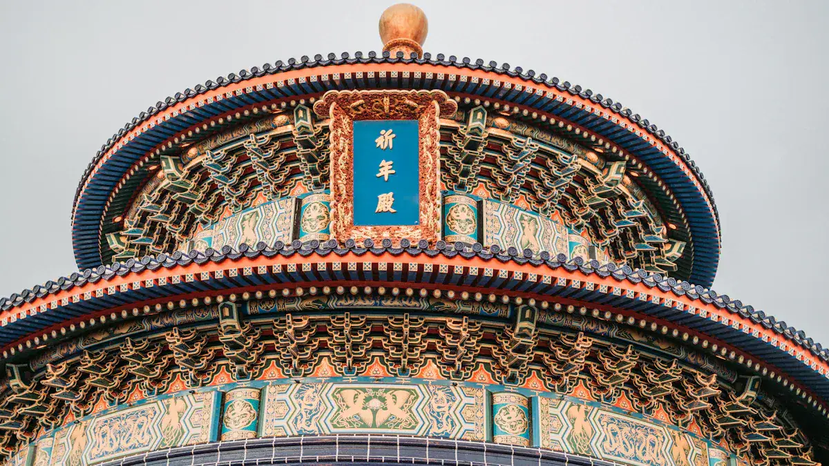 Ornately decorated circular Chinese temple roof with intricate woodwork, teal and gold patterns, and a blue plaque with gold Chinese characters at the center.