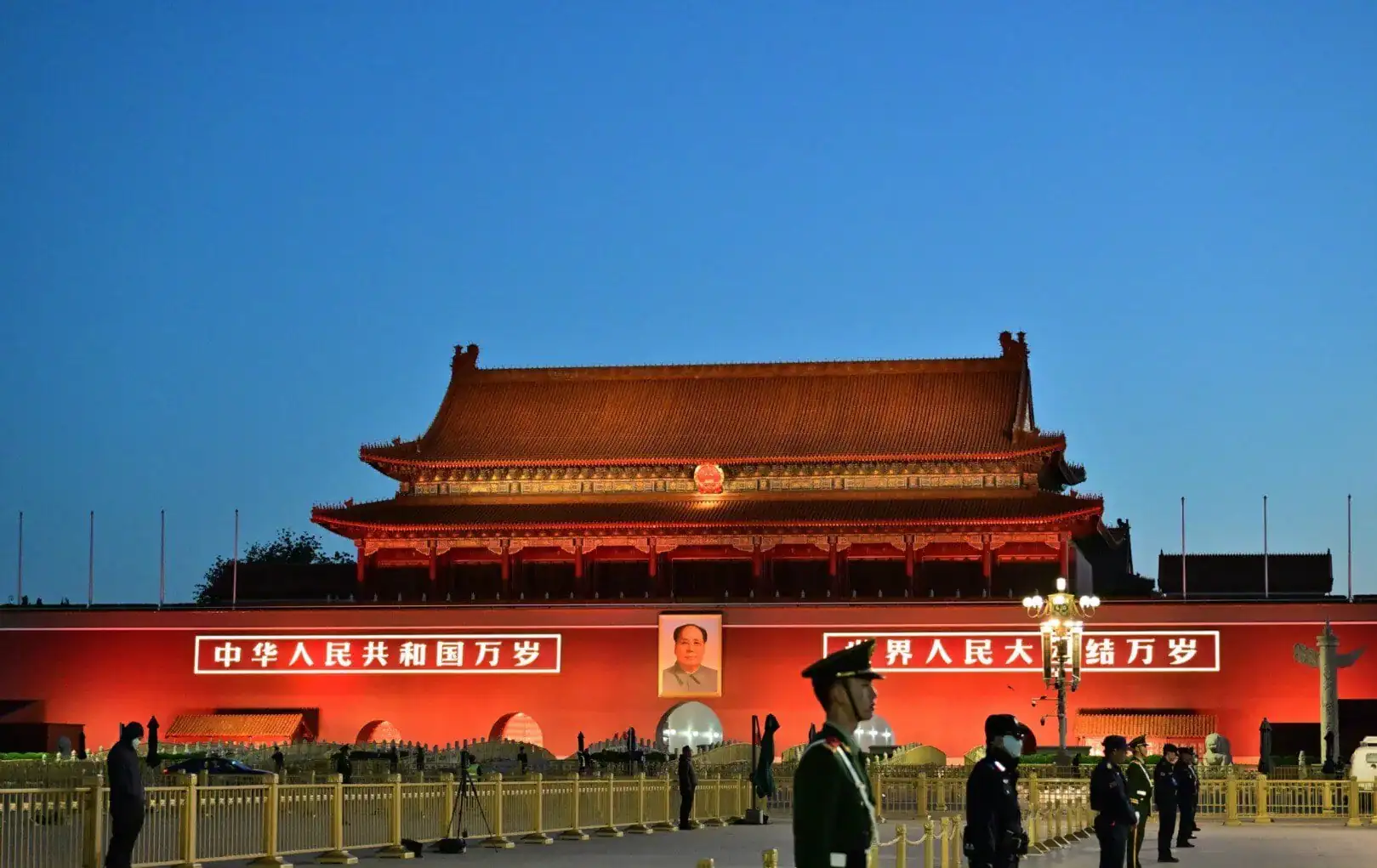Tian`anmen Square,Beijing,Chinatravel Tiananmen Gate at sunset in Beijing, China, with guards and traditional architecture.
