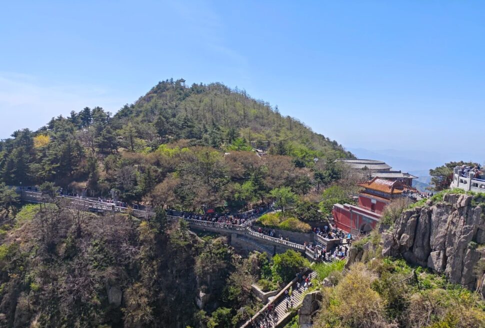 View of Mount Hua with pathways and visitors, China.