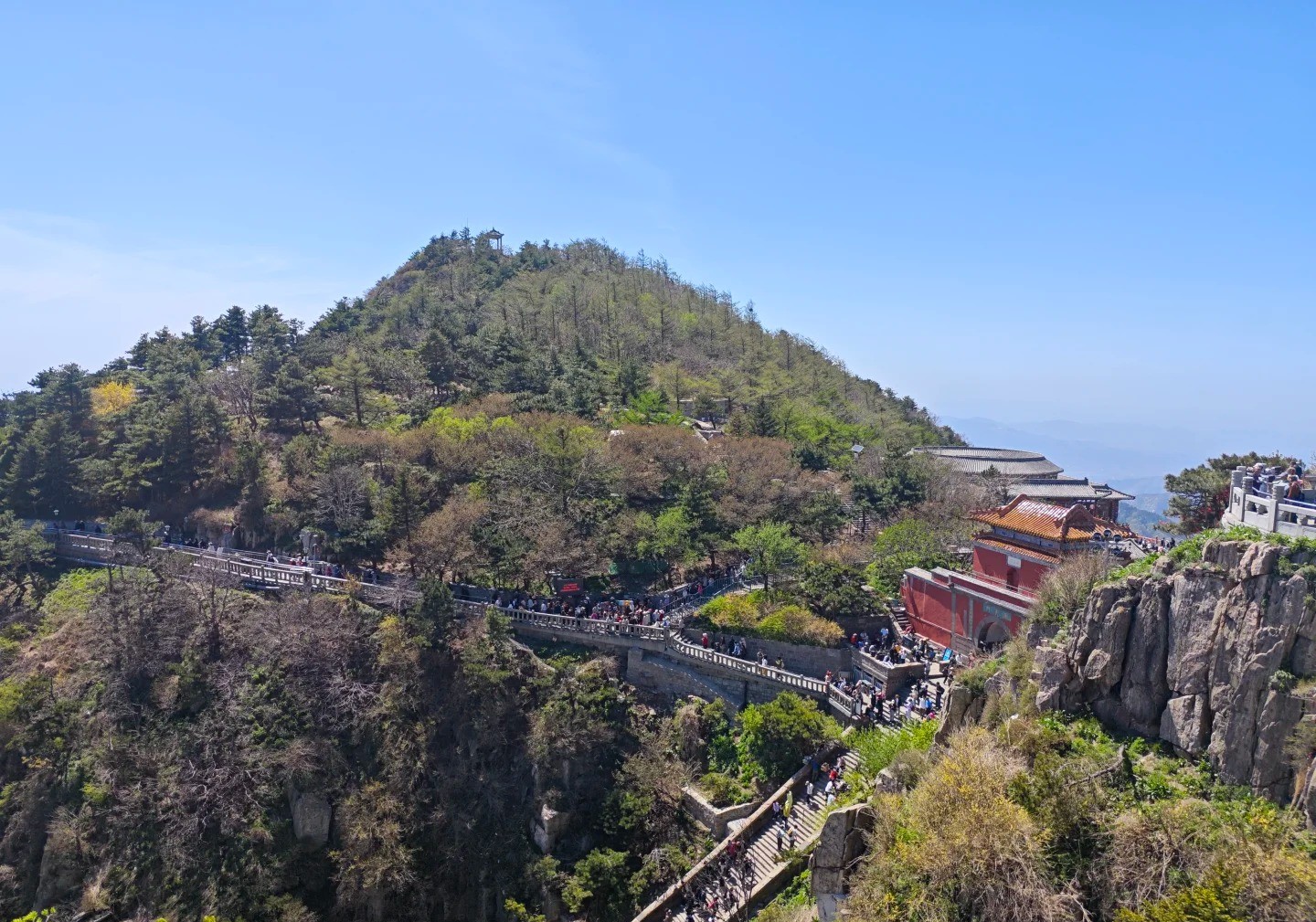 View of Mount Hua with pathways and visitors, China.