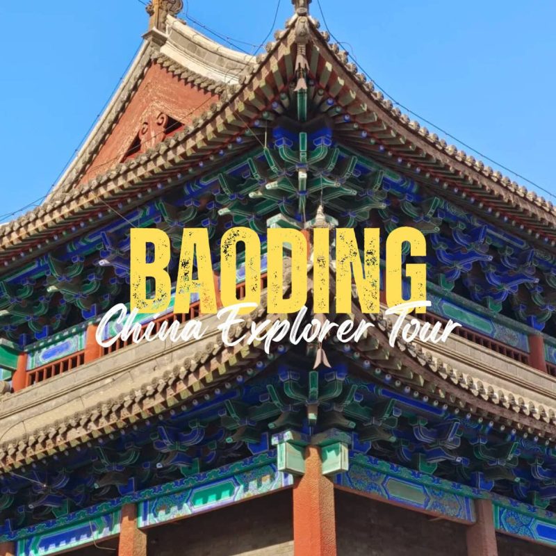 Baoding,Hebei,China tour Promotional banner for Baoding China Explorer Tour showing a colorful traditional temple roof against a blue sky.