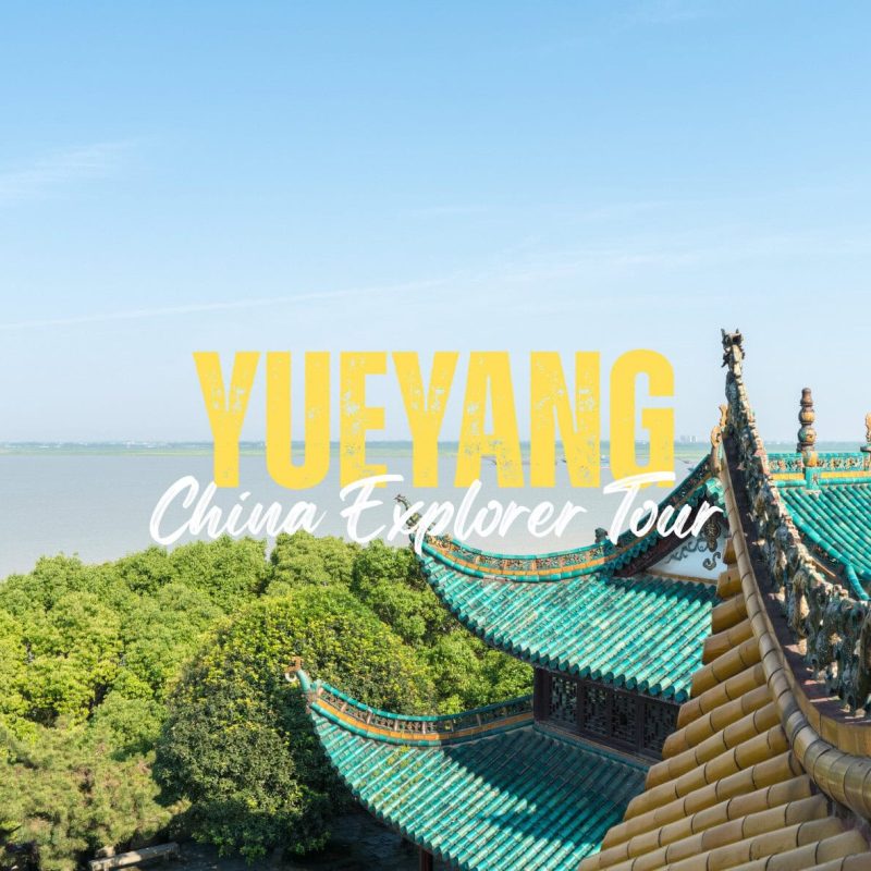 Yueyang,Hunann,Chinatravel Promotional banner for Yueyang China Explorer Tour with a teal-tiled temple roof, blue sky, and green trees in the background.