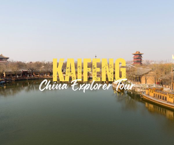 Kaifeng,Henan,Chinatravel Wide canal scene in Kaifeng with traditional buildings and a distant multi-tier pagoda, overlaid with bold yellow 'KAIFENG' and white 'China Explorer Tour' text.