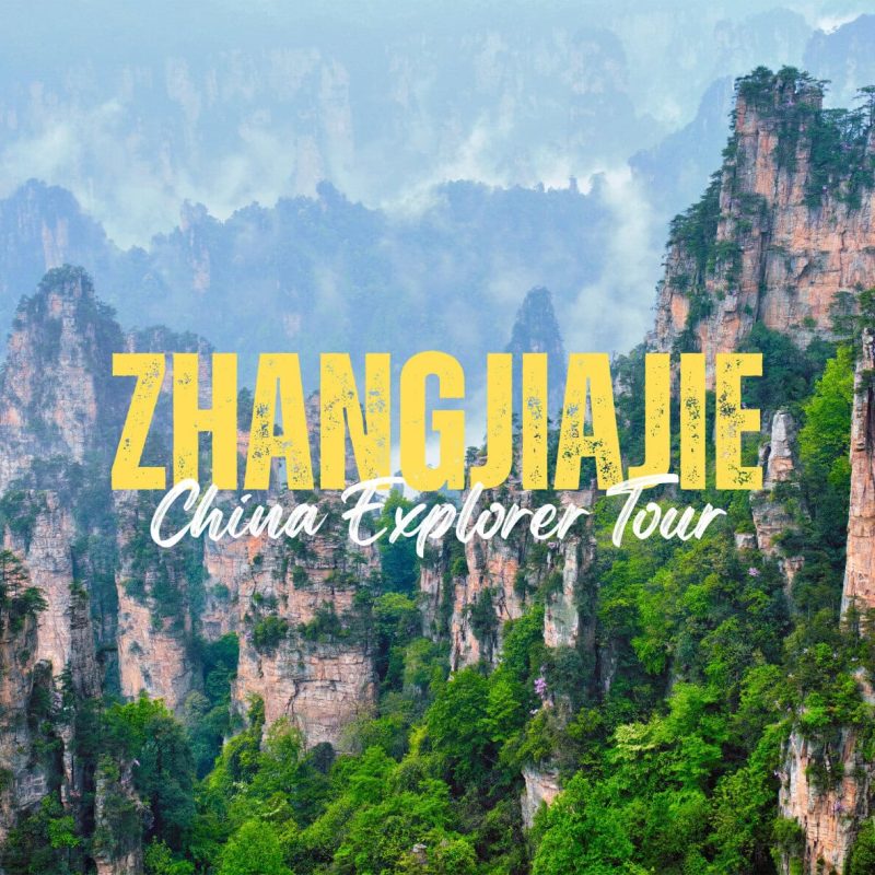 Zhangjiajie,Hunan,Chinatravel Promotional banner for Zhangjiajie China Explorer Tour with bold yellow text over misty limestone pillars in a forested canyon.