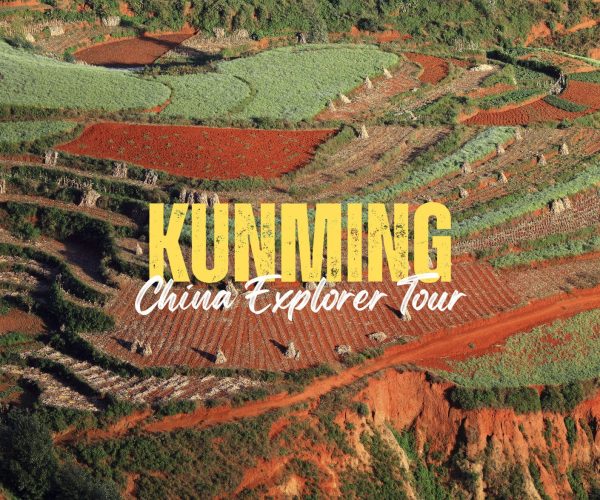 Kunming,Yunan,Chinatravel Aerial view of terraced fields in Kunming with red soil; overlayed text 'KUNMING China Explorer Tour'.