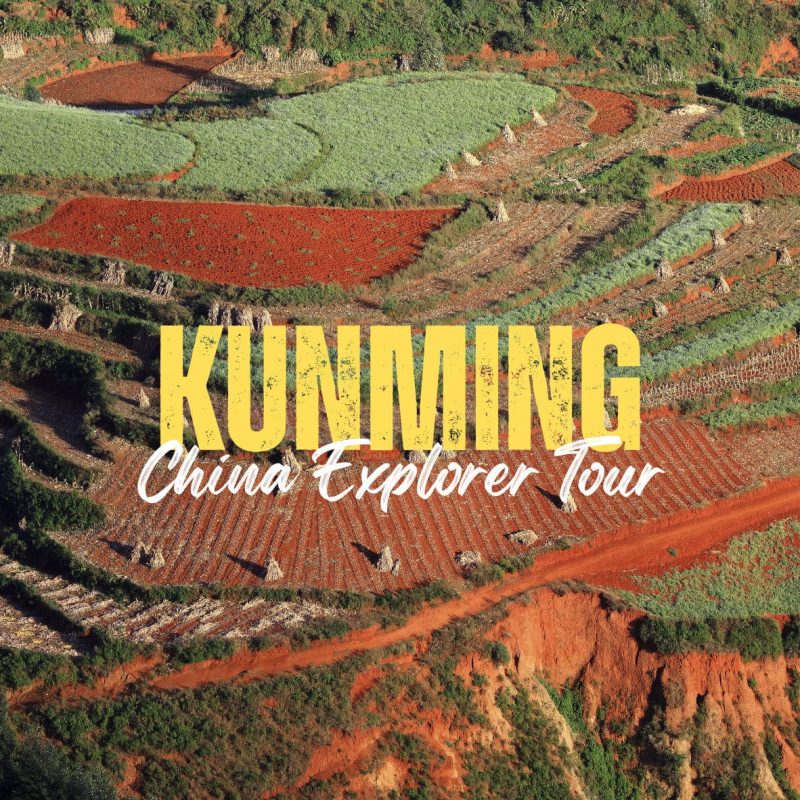 Kunming,Yunan,Chinatravel Aerial view of terraced fields in Kunming with red soil; overlayed text 'KUNMING China Explorer Tour'.