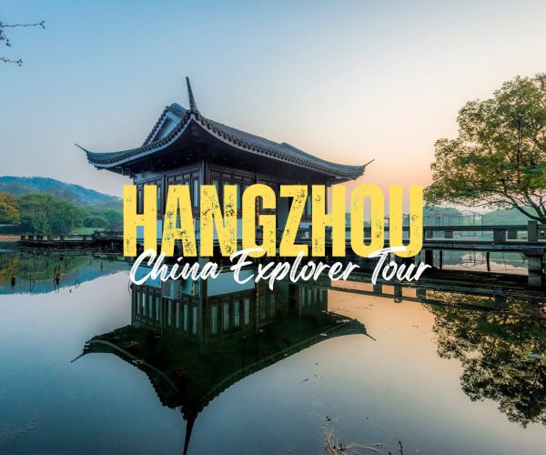 Hangzhou,Zhejiang,Chinatravel Promotional image of a traditional pavilion on a calm lake at sunset in Hangzhou, with large yellow 'HANGZHOU' and white 'China Explorer Tour' text overlaid, reflecting in the water.