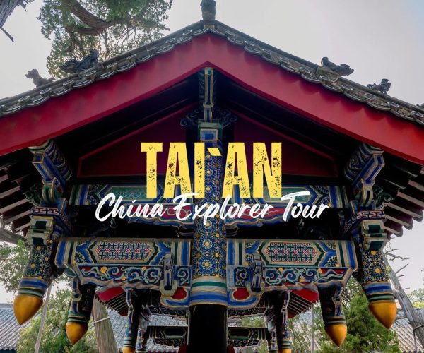 Tai'an,Shandong,China tour Promotional banner for a Taiwan travel tour with a traditional colorful Chinese pavilion and bold yellow 'TAIWAN' text overlaid, plus 'China Explorer Tour' in white script.