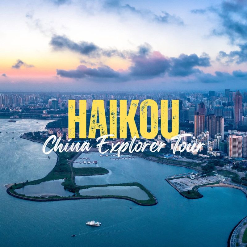 Haikou,Hainan,Chinatravel Aerial view of Haikou city along a waterway with a park island in the foreground and bold yellow text 'HAIKOU' with white script 'China Explorer Tour' overlaid.