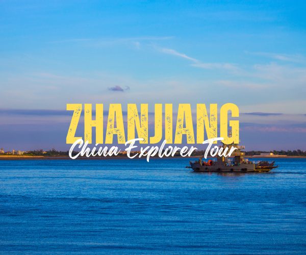 Zhanjiang,Guangdong,Chinatravel Promotional banner: bold yellow 'ZHANJANG' with white cursive 'China Explorer Tour' over a blue ocean and boat on the horizon.