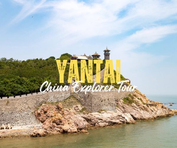 Yantai,Shangdong,China tour Promotional banner for Yantai China Explorer Tour: large yellow ‘YANTAI’ text over a coastal fortress on rocky cliffs by the sea.