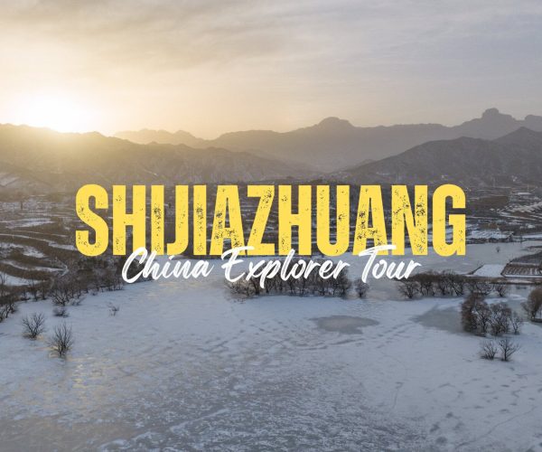 Shijiangzhuang,Hebei,China tour Shijiazhuang China Explorer Tour banner over a snow-covered valley at sunrise with yellow bold title text