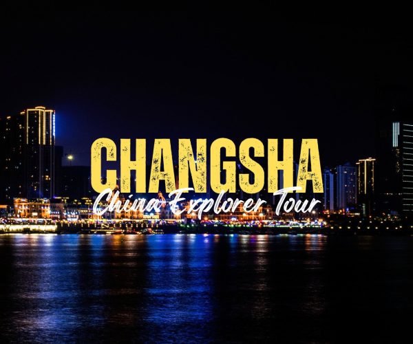 Changsha,Hunan,Chinatravel Nighttime Changsha skyline with river reflections; bold yellow CHANGSHA and white cursive China Explorer Tour text over the city lights (promotional banner).
