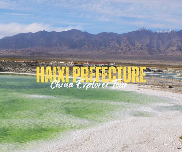 Haixi Prefecture,Qinghai,China tour Promotional banner for Haxi Prefecture tourism: bold yellow text overlays a green lake and distant mountains (China Explorer Tour).