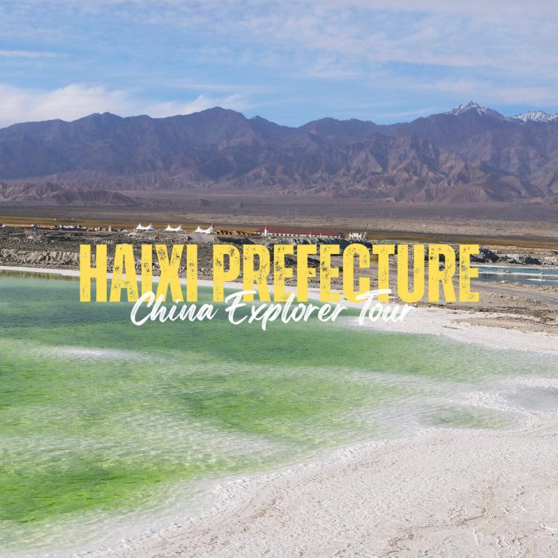 Haixi Prefecture,Qinghai,China tour Promotional banner for Haxi Prefecture tourism: bold yellow text overlays a green lake and distant mountains (China Explorer Tour).