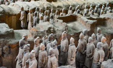 Terra Cotta Warriors, xi'an, china, china tour, Rows of life-size terracotta soldiers standing in long clay pits, part of China's Mausoleum of the First Qin Emperor.