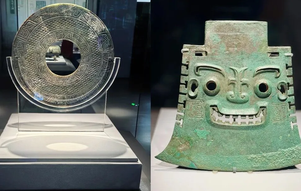 Circular carved stone disk with a central hole and intricate geometric patterns on display stand, museum exhibit piece for communication and ritual use,Shandong Museum,Jinan,Shandong,Chinatravel
