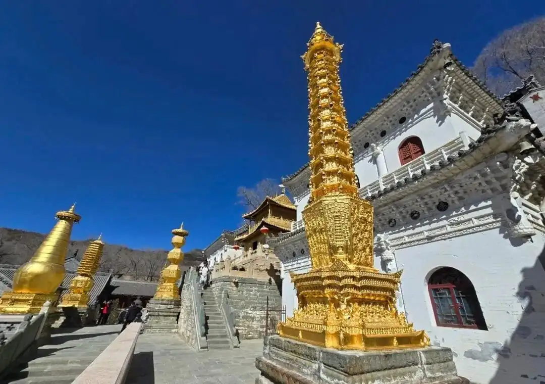Golden pagoda and temple at Mount Emei, a famous Buddhist site in Sichuan, China.