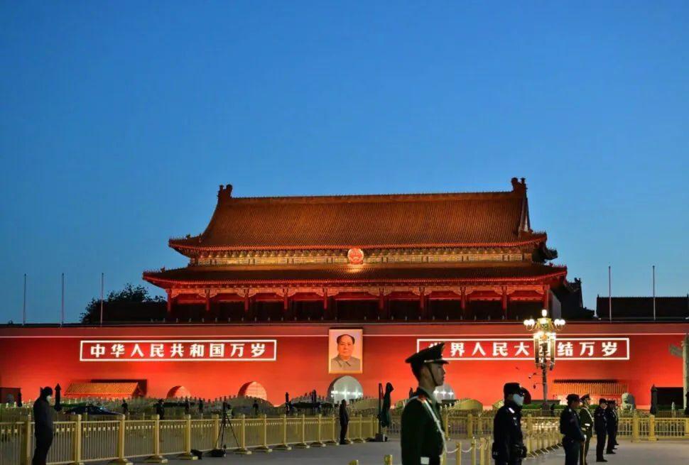 Tian`anmen Square,Beijing,Chinatravel Tiananmen Gate at sunset in Beijing, China, with guards and traditional architecture.