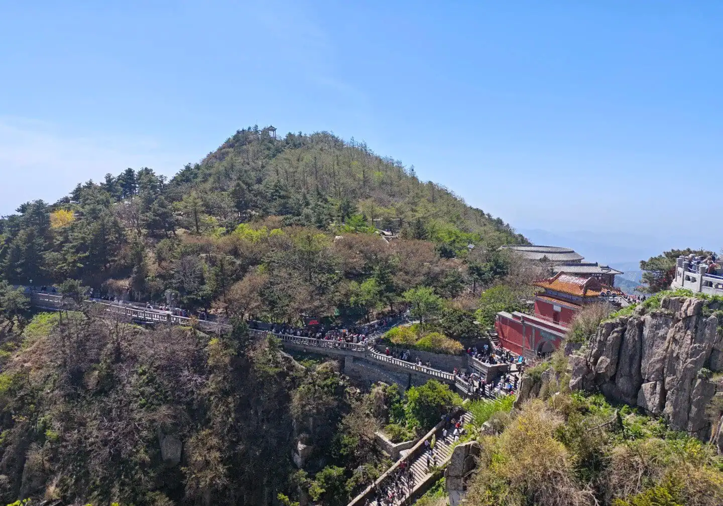 View of Mount Hua with pathways and visitors, China.