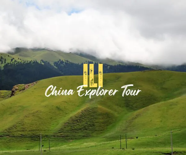 Ili,Xinjiang,China tour Banner-style photo of green rolling hills under a cloudy sky with a yellow three-bar logo and the text 'China Explorer Tour' in white script.