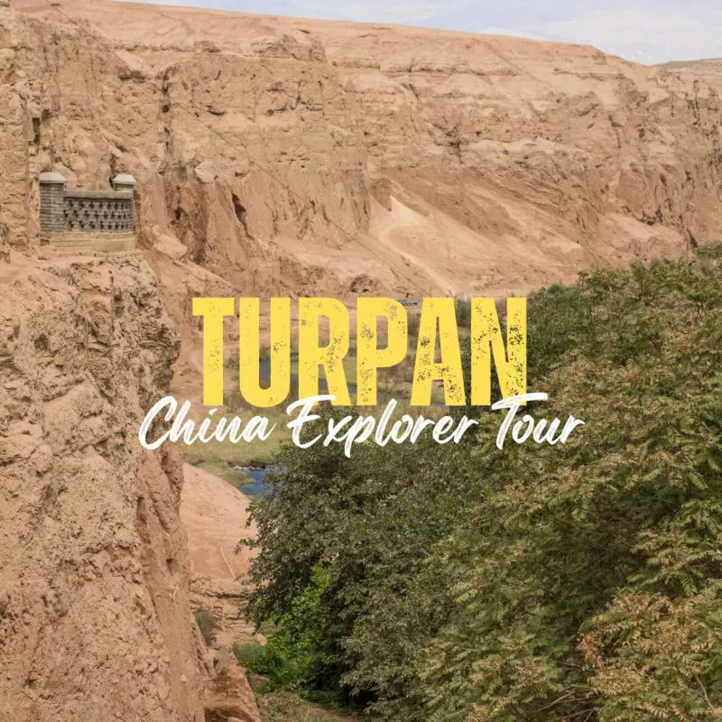 Turpan,Xinjiang,China tour Desert canyon with bold yellow 'TURPAN' and white 'China Explorer Tour' text overlay, promoting a tour.