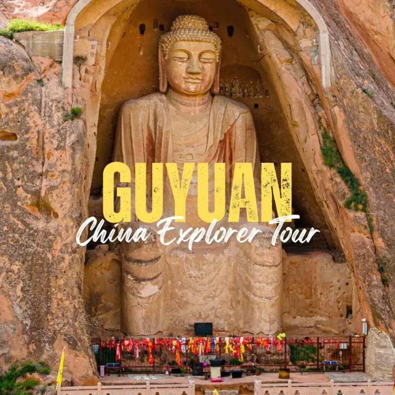 Guyuan,Ningxia,China tour Rock-cut Buddha statue inside a canyon, with yellow tour text overlay reading 'GUYUAN China Explorer Tour'
