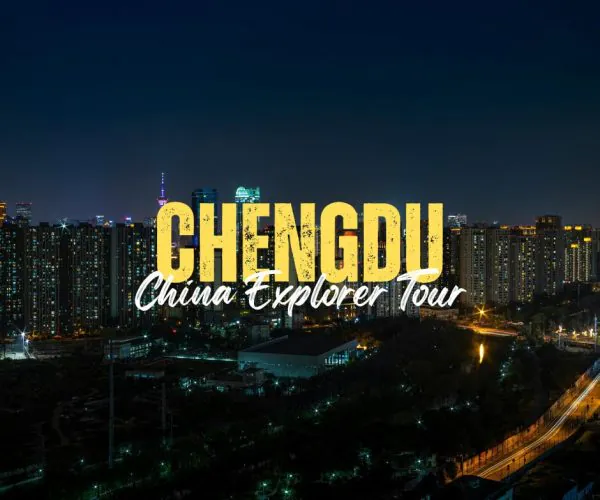 Chengdu,Sichuan,Chinatravel Nighttime city skyline of Chengdu with bold yellow 'CHENGDU' and white script 'China Explorer Tour' across the center