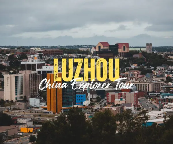 Luzhou,Sichuan,Chinatravel Promotional banner of Luzhou city skyline with yellow 'LUZHOU' and white 'China Explorer Tour' text.
