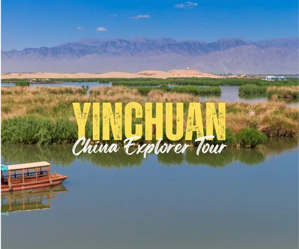 Yinchuan,Ningxia,China tour Desert landscape with dunes, green wetlands, and a calm river with a small wooden boat; overlaid bold yellow text reads 'YINCHUAN' and cursive 'China Explorer Tour'.