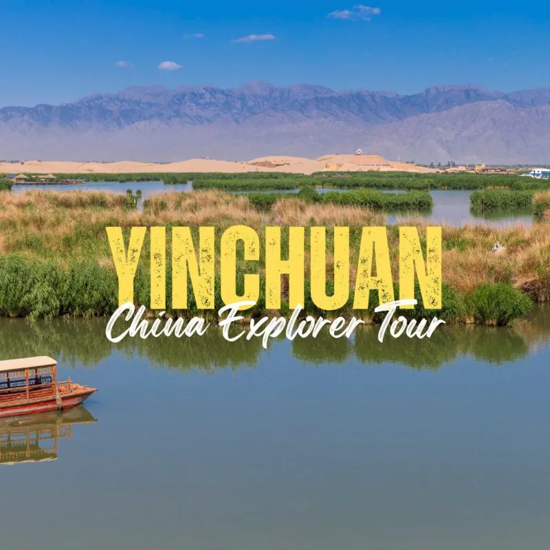 Yinchuan,Ningxia,China tour Desert landscape with dunes, green wetlands, and a calm river with a small wooden boat; overlaid bold yellow text reads 'YINCHUAN' and cursive 'China Explorer Tour'.